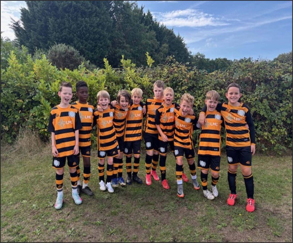 Curley Park Rangers Under 10 Bears squad in black and amber kit